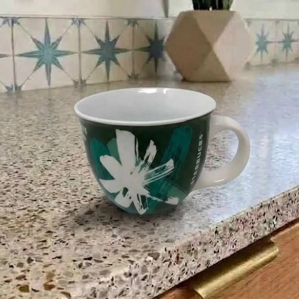 Starbucks 2014 Holiday Green White Starburst City Ceramic Coffee Mug 14 oz